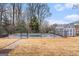 Backyard pool with shed surrounded by a fence for privacy and security at 149 Crown Oaks Dr, Stockbridge, GA 30281