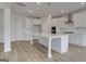 Modern kitchen island and stainless steel appliances at 127 Felicity Pike, Locust Grove, GA 30248