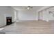 Spacious living room boasts a cozy fireplace and an open floor plan at 127 Felicity Pike, Locust Grove, GA 30248