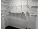 Spacious walk-in closet featuring white wire shelving for optimal storage and organization at 554 Fieldstream Way, Lawrenceville, GA 30044