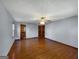 Large bedroom featuring hardwood floors, neutral wall color and double closets for storage at 114 Mcbride Rd, Fayetteville, GA 30215