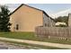 View of the backyard with a privacy fence and lush green lawn at 6001 Nile Ct, Atlanta, GA 30349