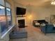 Living room with fireplace, television and multiple seating options at 6001 Nile Ct, Atlanta, GA 30349