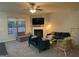 Inviting living room with cozy furniture, fireplace, and lots of natural light at 6001 Nile Ct, Atlanta, GA 30349