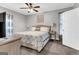 Bedroom features neutral walls, ceiling fan and a bed with coordinating comforter set at 4481 Mclain Cir, Acworth, GA 30101