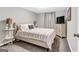 Cozy bedroom featuring a comfortable bed, side tables, and soft lighting, perfect for restful nights at 4481 Mclain Cir, Acworth, GA 30101