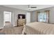 Spacious bedroom showcasing a king-size bed, a chest of drawers, and neutral tones at 4481 Mclain Cir, Acworth, GA 30101