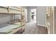 Neutral color bedroom with bunk beds and ceiling fan, creating a calm and inviting sleep space at 4481 Mclain Cir, Acworth, GA 30101