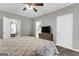 Neutral bedroom featuring a ceiling fan and a coordinating comforter set on the bed at 4481 Mclain Cir, Acworth, GA 30101