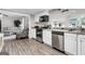Bright kitchen leads into a comfortable living room, creating an open and inviting space for Gathering gatherings and guests at 4481 Mclain Cir, Acworth, GA 30101