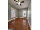 Bedroom showcasing hardwood floors, natural light and gray walls at 18 Laurel St, Covington, GA 30014