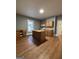 Large kitchen with island, wooden cabinets, updated appliances and great lighting at 18 Laurel St, Covington, GA 30014