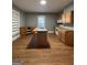 Expansive kitchen with a central island, wooden cabinets, and modern appliances at 18 Laurel St, Covington, GA 30014