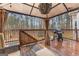 Outdoor patio with a covered pergola and a barbecue, perfect for outdoor entertaining at 65 Ashland Grove Ct, Sharpsburg, GA 30277