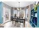 Bright eat-in dining room with backyard view at 65 Ashland Grove Ct, Sharpsburg, GA 30277