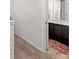 Hallway view into bathroom with double vanity, brown cabinets, and pink rug at 340 Layfield Dr, Jonesboro, GA 30238