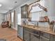 Kitchen area featuring granite countertops, stainless steel appliances, and ample natural light at 340 Layfield Dr, Jonesboro, GA 30238