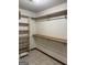 Walk-in closet with shelving at 5207 Sw West Shore Dr, Conyers, GA 30094