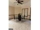 Modern dining room featuring a glass table, comfortable seating, and a ceiling fan at 5207 Sw West Shore Dr, Conyers, GA 30094