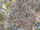 An aerial view shows the wooded lot with mature trees surrounding the property at 1436 Heritage Court Ct, Villa Rica, GA 30180