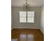 Bright dining room with hardwood floors and a chandelier at 1436 Heritage Court Ct, Villa Rica, GA 30180