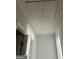 Hallway with a ceiling access point, neutral paint and white trim at 1436 Heritage Court Ct, Villa Rica, GA 30180