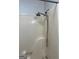Close-up of a shower with a handheld sprayer and sleek, minimalist design at 1436 Heritage Court Ct, Villa Rica, GA 30180