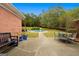 Beautiful backyard with a sparkling in-ground pool and patio area, perfect for outdoor relaxation and entertainment at 605 Clearwater Ct, Mcdonough, GA 30252