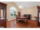 Elegant dining room with hardwood floors, a chandelier, and classic furniture at 605 Clearwater Ct, Mcdonough, GA 30252