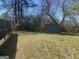 Spacious backyard with storage shed, offering great potential for landscaping and outdoor activities at 6861 Wendy Jean Dr, Morrow, GA 30260