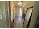 Hallway with entry to the front door and downstairs at 6861 Wendy Jean Dr, Morrow, GA 30260