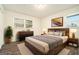 Bedroom featuring wood-look flooring and bright natural light at 5595 Richland Dr, Douglasville, GA 30135