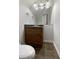 Bathroom featuring a single vanity, mirror, and tile flooring at 10067 Freeman Ct, Jonesboro, GA 30236