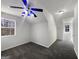 Bedroom with unique ceiling texture, a ceiling fan, and natural light at 10067 Freeman Ct, Jonesboro, GA 30236