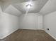 Bedroom features unique ceiling texture, neutral carpeting, and a closet at 10067 Freeman Ct, Jonesboro, GA 30236