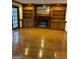 Spacious living room with hardwood floors, a fireplace, and custom built-ins at 105 Windridge Dr, Fayetteville, GA 30215