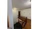 Carpeted staircase with wood trim and white walls at 105 Windridge Dr, Fayetteville, GA 30215