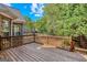 Spacious wooden back deck with natural light offers an inviting outdoor area for relaxation and entertainment at 1500 Royce Dr, Locust Grove, GA 30248