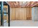 Unfinished basement featuring exposed framing offering a blank canvas for customization and future expansion at 1500 Royce Dr, Locust Grove, GA 30248