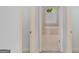 View of a bathroom, with a tub and a window at 1500 Royce Dr, Locust Grove, GA 30248