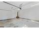 Spacious garage with high ceilings, bright lighting, and ample room for storage and parking at 1500 Royce Dr, Locust Grove, GA 30248