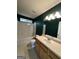 Full bathroom with a shower-tub combo and vanity offers a convenient space at 187 London Dr, Mcdonough, GA 30253