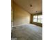 Bright bedroom with a large window and neutral carpet provides a comfortable space at 187 London Dr, Mcdonough, GA 30253