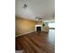Spacious living room with hardwood floors and a cozy fireplace provides a welcoming atmosphere at 187 London Dr, Mcdonough, GA 30253