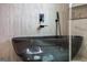 A luxurious bathtub with sleek, modern black fixtures at 292 Highway 279, Fayetteville, GA 30215