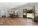 Spacious dining room featuring wood floors, a chandelier, and a view of the outdoors at 1185 Old Greenville Rd, Fayetteville, GA 30215