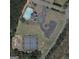 Aerial view of the community pool, tennis courts, and playground at 85 Crabapple Ridge Dr, Oxford, GA 30054