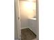 A laundry room area with washer and dryer, and laminate flooring at 85 Crabapple Ridge Dr, Oxford, GA 30054