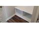 Convenient mudroom entrance with built-in bench and storage cubbies for organization at 85 Crabapple Ridge Dr, Oxford, GA 30054