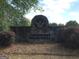 Stone Northwood Community Entrance Sign with lush landscaping at 85 Crabapple Ridge Dr, Oxford, GA 30054